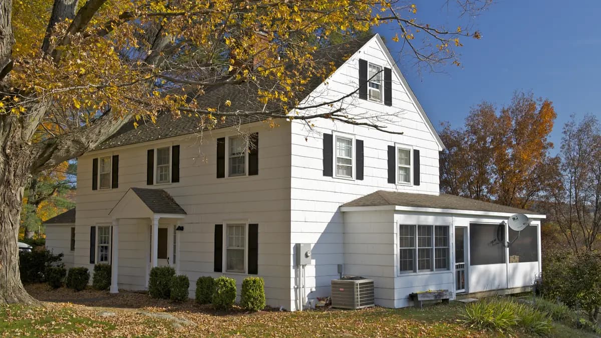Interior renovation in progress during winter in a Greater Boston home with snow visible through the window