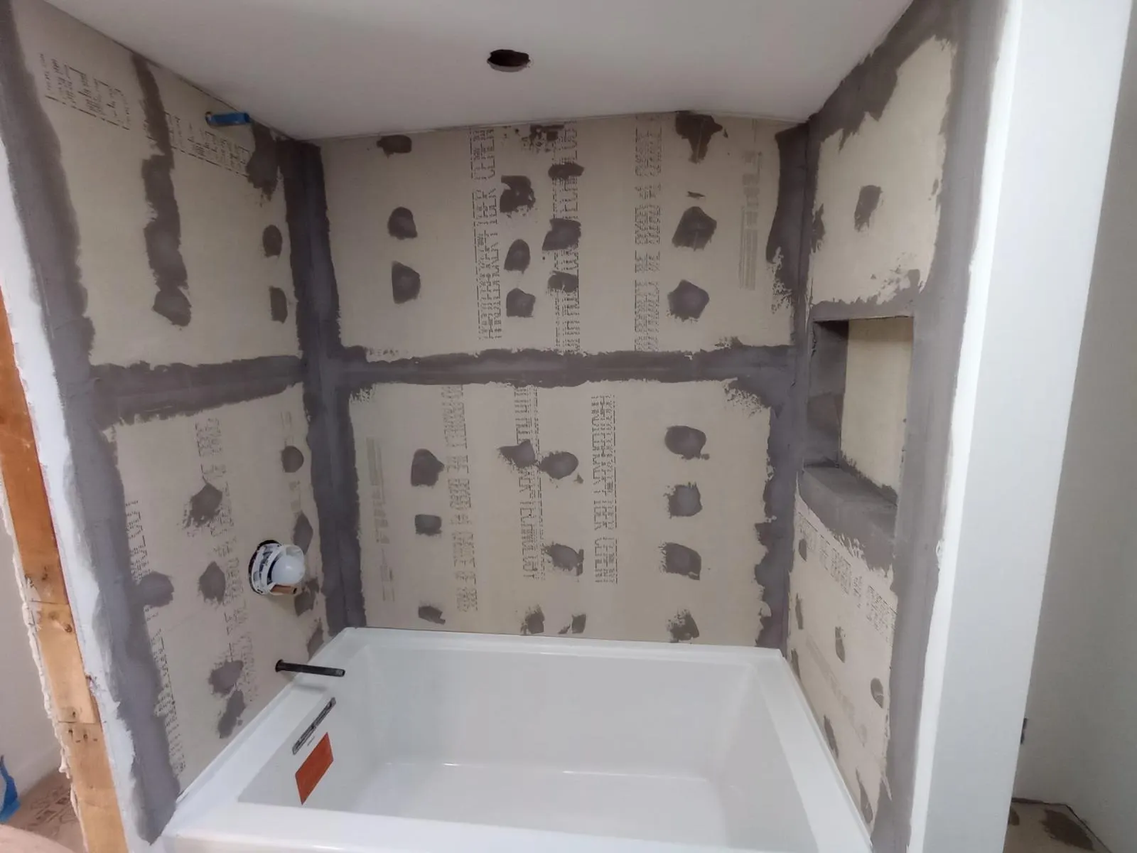 Shower board with sealed seams, ready for tile